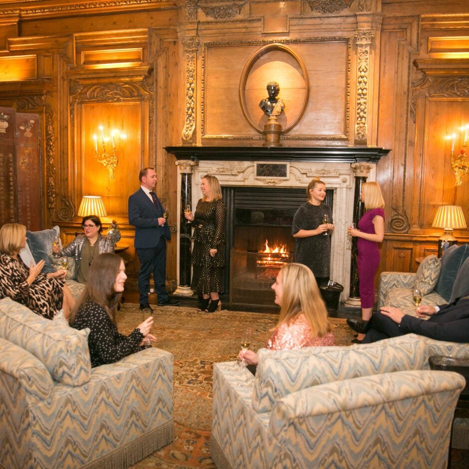 VIP Events at Leeds Castle - people sitting on sofas in a grand lounge